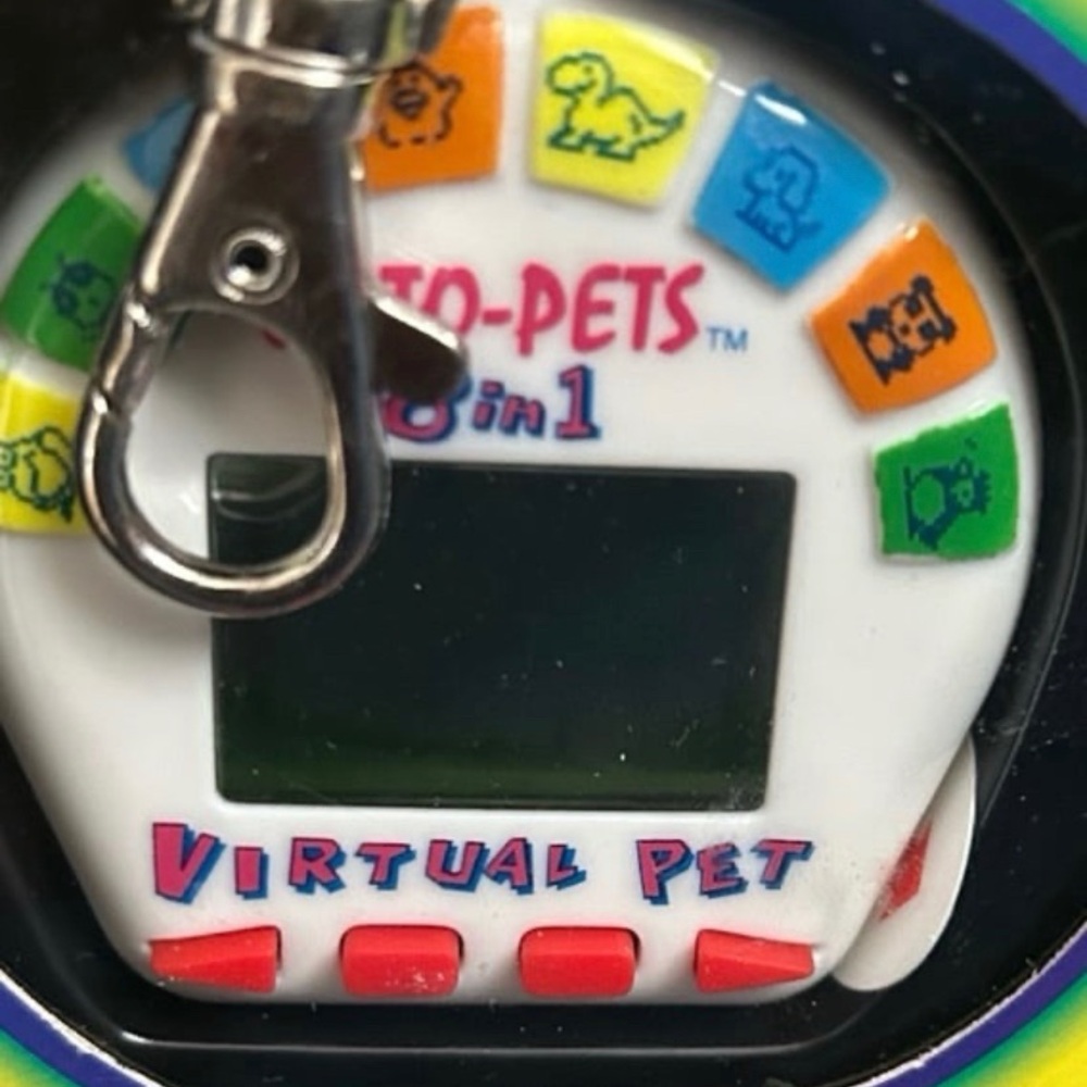 Octo-Pets 8 in 1 Virtual Pet Tamagotchi Style 1997 SEALED - Picture 2 of 12